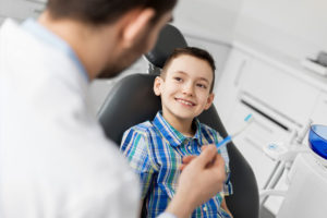 Young boy at the dentist.